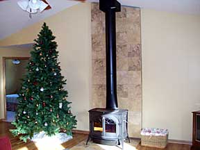 wood stove with tile backsplash