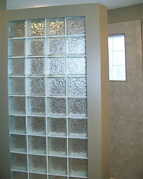 custom glass block wall and walk-in tile shower