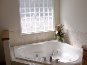 whirlpool tub with glass block window
