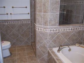 walk-in tile shower with window