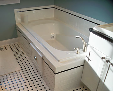 master bath with custome tile and whirlpool tub