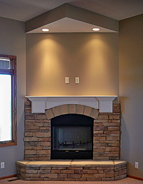 stone fireplace with custom mantel