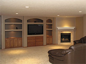 basement remodel with fireplace and built-ins